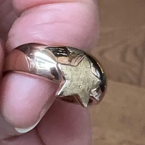 Beautiful rose gold over silver star ring size 7 1/2.  Stamped 9.25